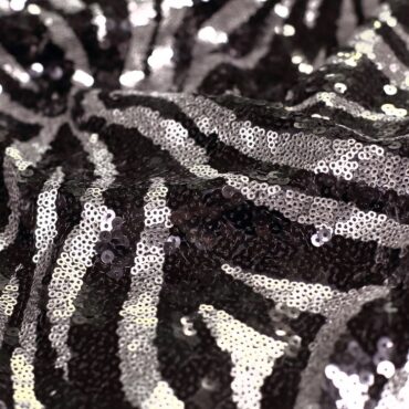 materiał cekinowy dwukolorowe, motyw zebra, oczka połysk: czerń, srebro