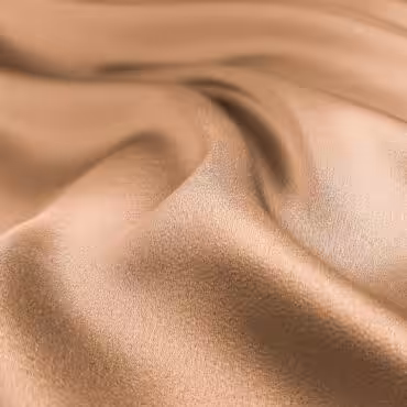 Tkanina syntetyczna gładka, złocisty ciepły beż, połysk
