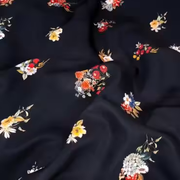 Syntetyczna tkanina  drobne bukiety kwiatów na granacie