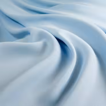 Tkanina syntetyczna gładka, krepa, błękitna, z wiskozą i elastanem