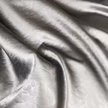 Syntetyczna tkanina wytłaczana, srebrna z nutą beżu, elastyczna