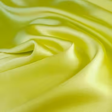 satyna kryjaca limonka z elastanem syntetyczna tkaninaA