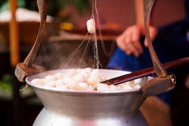 silk cocoons boiling in large pot 2021 08 26 16 28 55 utc