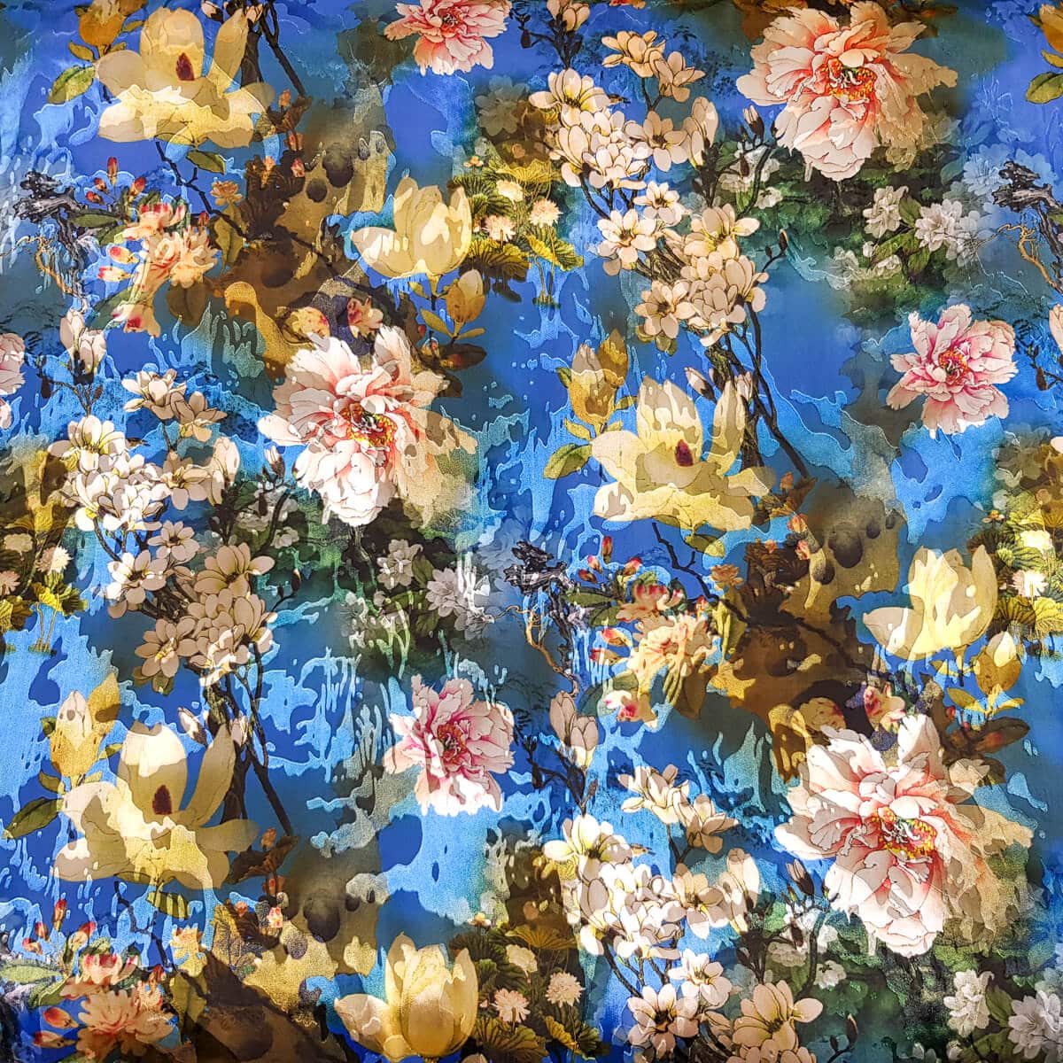 jedwab devore w kwiaty niebieski pol-przezroczystyE