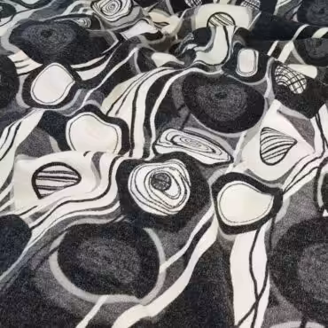 dzianina sweterkowa welna z akrylem bialo-czarna kolaA