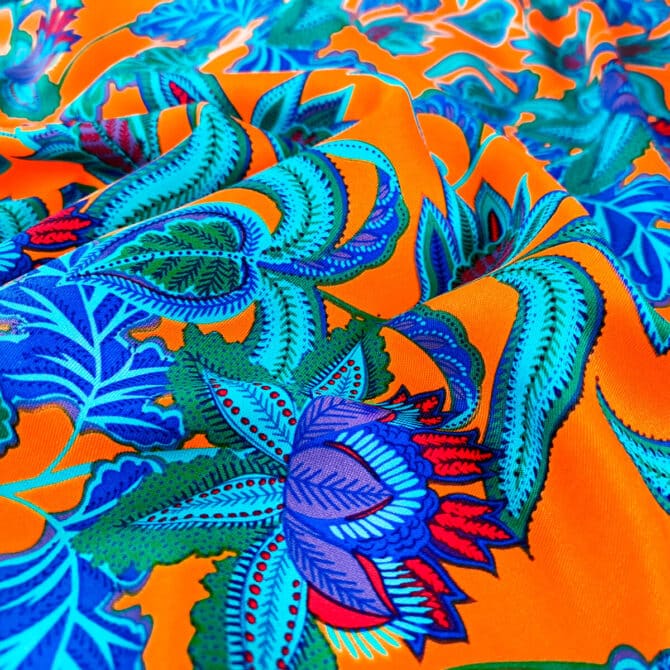 wiskoza sukienkowa w kwiaty pomarańczowa z niebieskimC