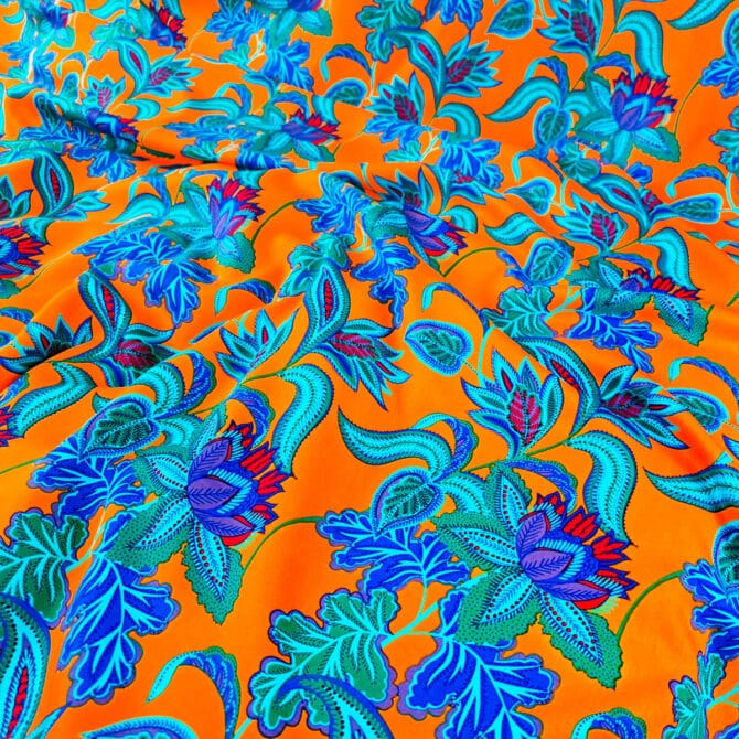 wiskoza sukienkowa w kwiaty pomarańczowa z niebieskimD