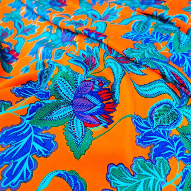 wiskoza sukienkowa w kwiaty pomarańczowa z niebieskimE