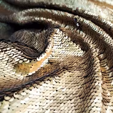 material cekinowy zloty z czarnym elastyczny cekiny 3dD