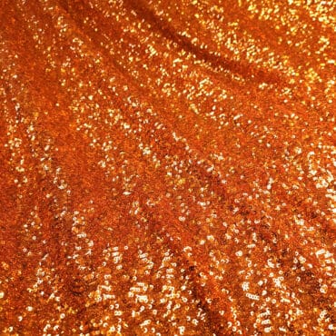 material cekinowy na tiulu pomaranczowy elastycznyB