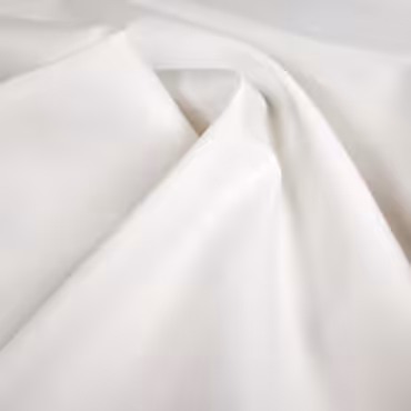 biala bawelna z polyskiem grubsza elastyczna nablyszczanaA