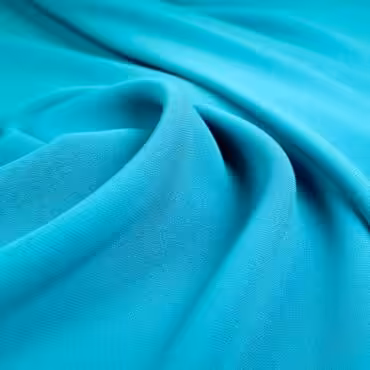 tkanina syntetyczna gladka krepa niebieskaA