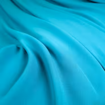 tkanina syntetyczna gladka krepa niebieskaB