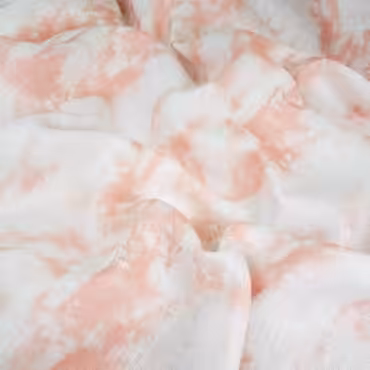 len we wzory tie dye brzoskwiniowy roz na bieliA