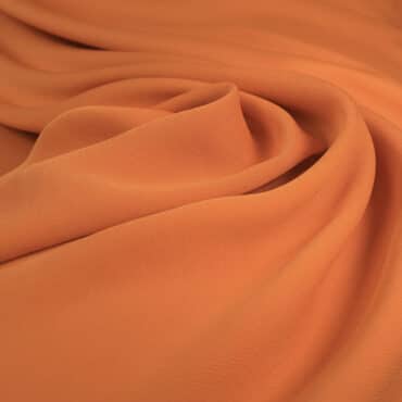 jednolity material rayon pomaranczowy lekko elastycznyA