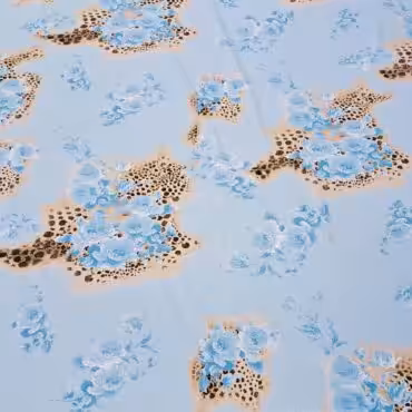 wysokojakościowy poliester we wzory panterka i kwiaty niebieski cętki brązowe na beżowym tle