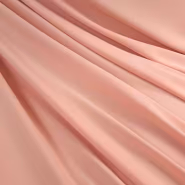 krepa róż brzoskwiniowy jednolita lekko elastyczna poliester z wiskozą i elastanem