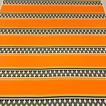 jedwab błyszczący elastyczny pomarańczowy pasy zygzaki pełna szerokość tkaniny