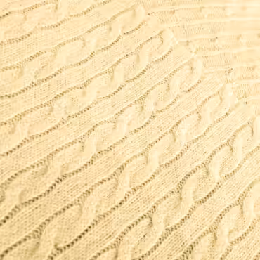 pastelowa dzianina sweterkowa warkocz wełna naturalna żółta