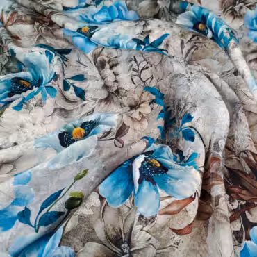 wiskoza żakardowa wzór kwiaty niebieskie na kamiennym tle